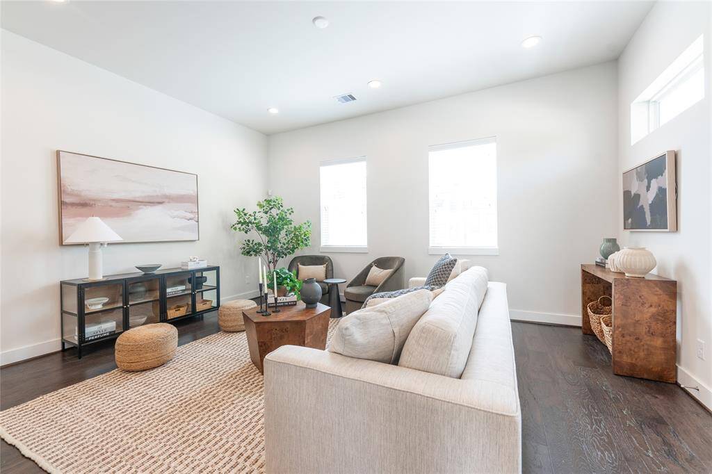 Experience modern elegance in this beautifully designed living space, perfect for relaxation and entertaining.