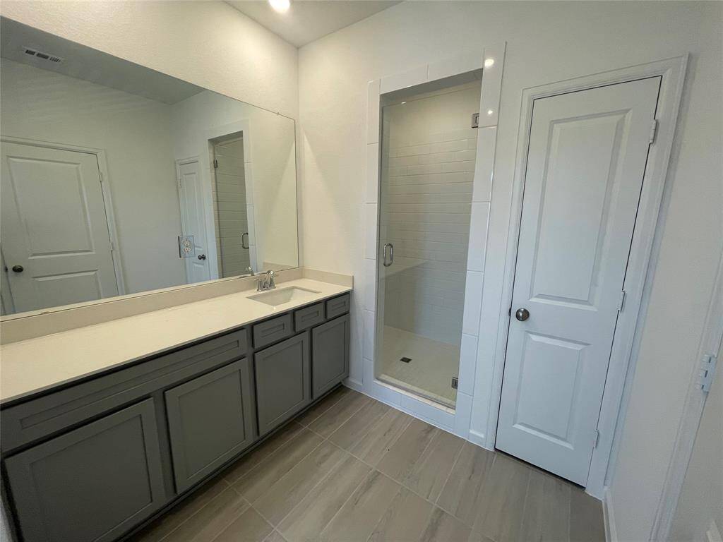 Primary bathroom with walk in shower.