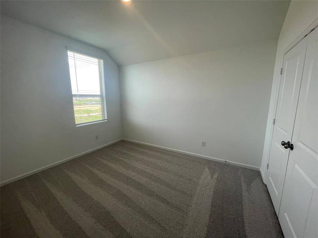 Bedroom 1 with large closet. The window in this room overlooks the lake, too!