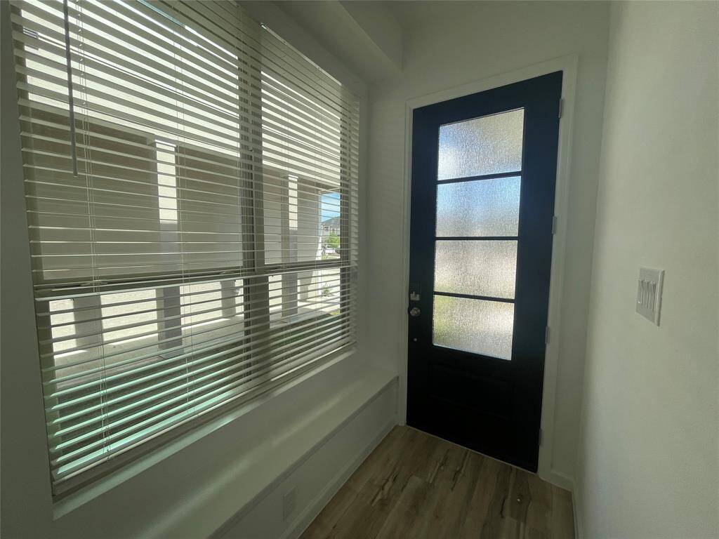 Front entryway complete with a window seat.