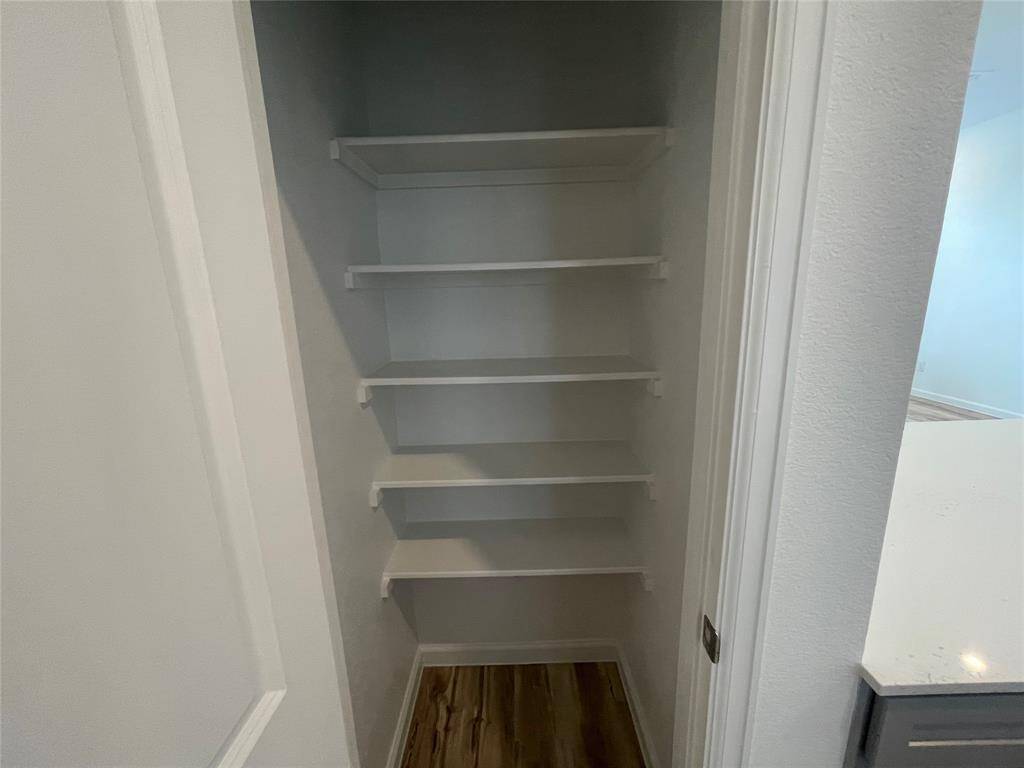 Nice sized pantry in the kitchen.