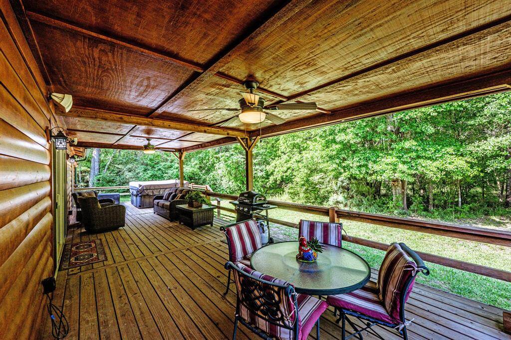 Peaceful covered back deck & hot tub