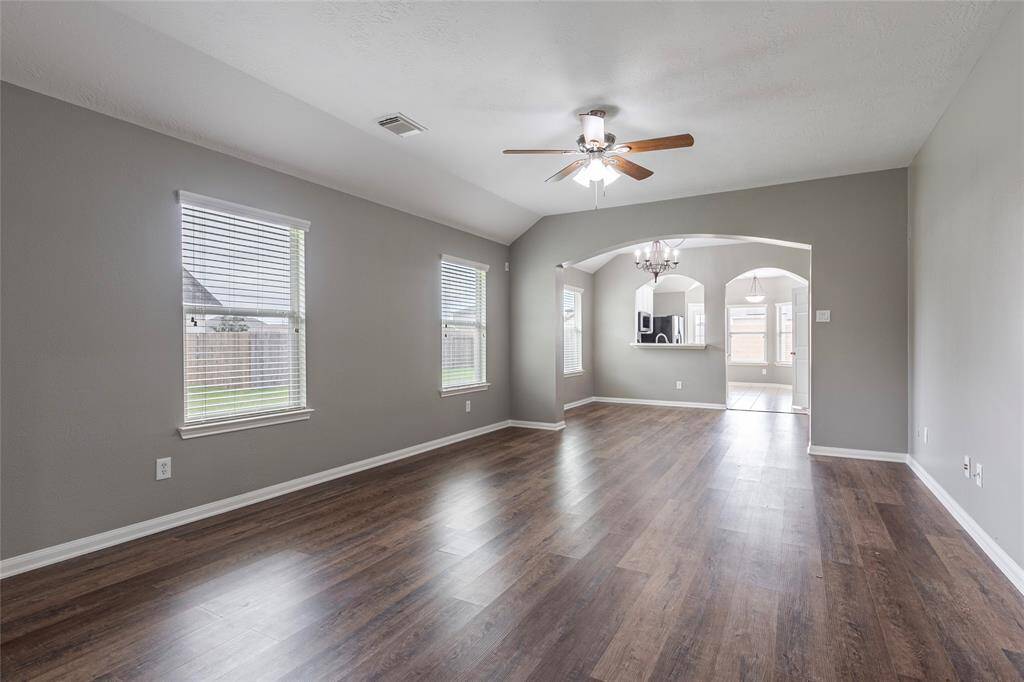 The floor plan offers an open concept from the living room, dining room, and kitchen.