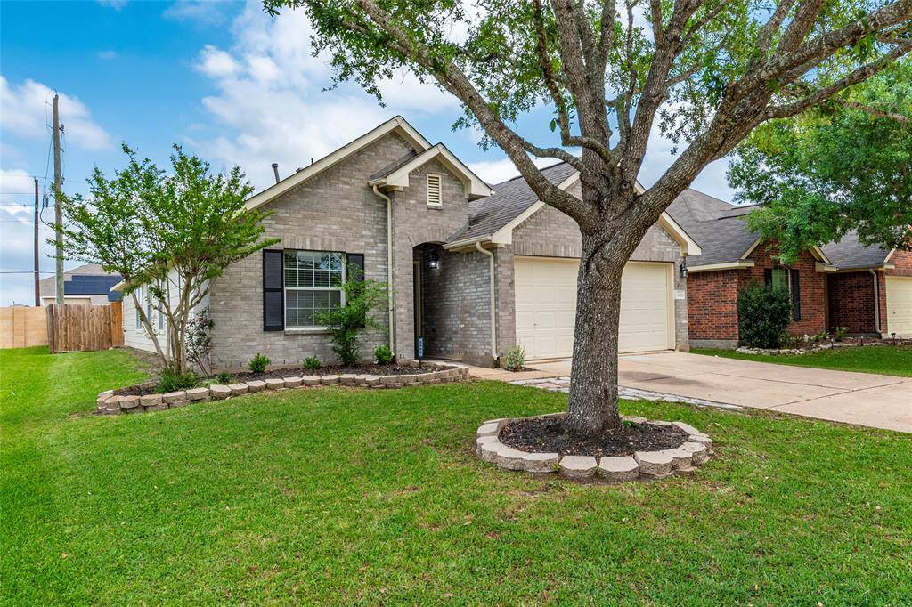 To the left is a green space offering more privacy between you and your neighbor.