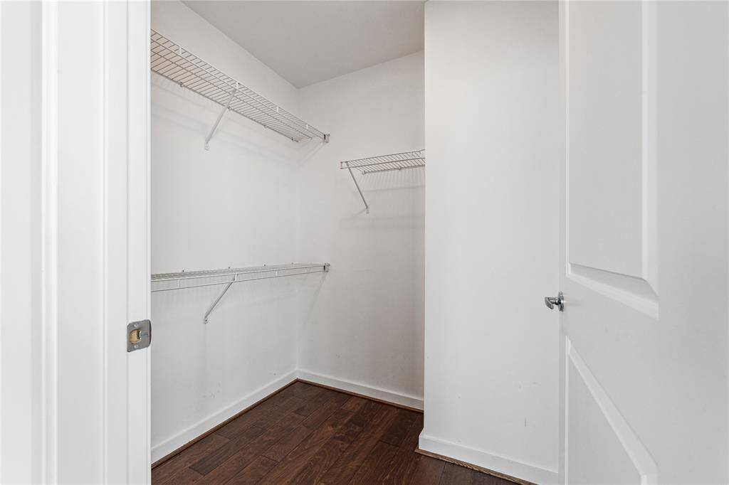 Walk-in closet in the primary bedroom.