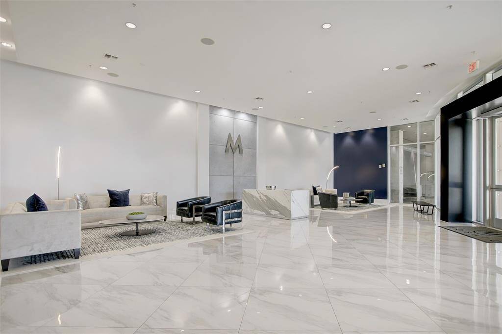 Modern high-rise lobby, where luxury and contemporary design converge to create a truly captivating space.