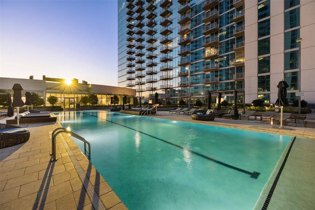 Rooftop infinity pool with private cabanas, jacuzzi, gas grills, Tv's, social lounge, and fire pits.