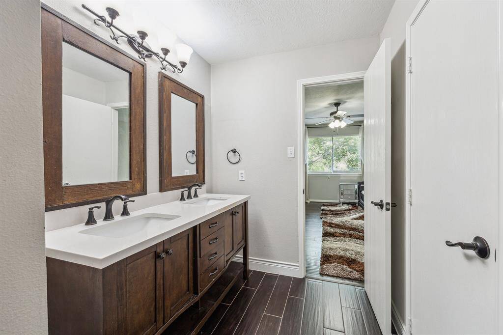 Full bath with dual sinks. Bathroom has Tub/Shower combo