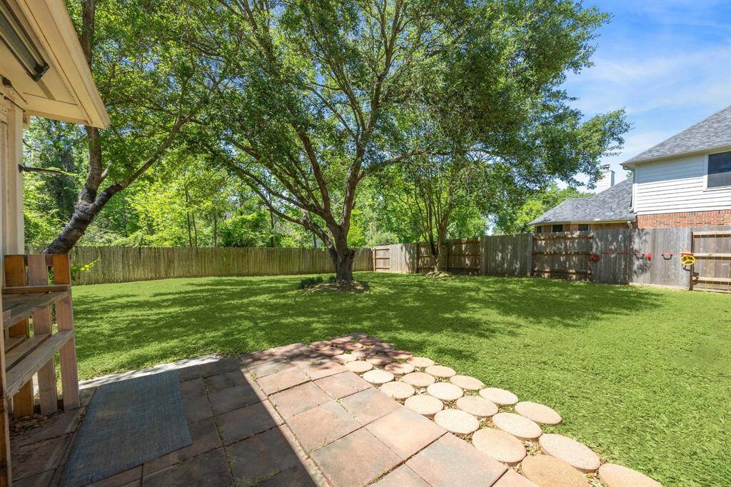 Look how spacious this backyard is. Plenty of space to enjoy outdoor activities with the family.