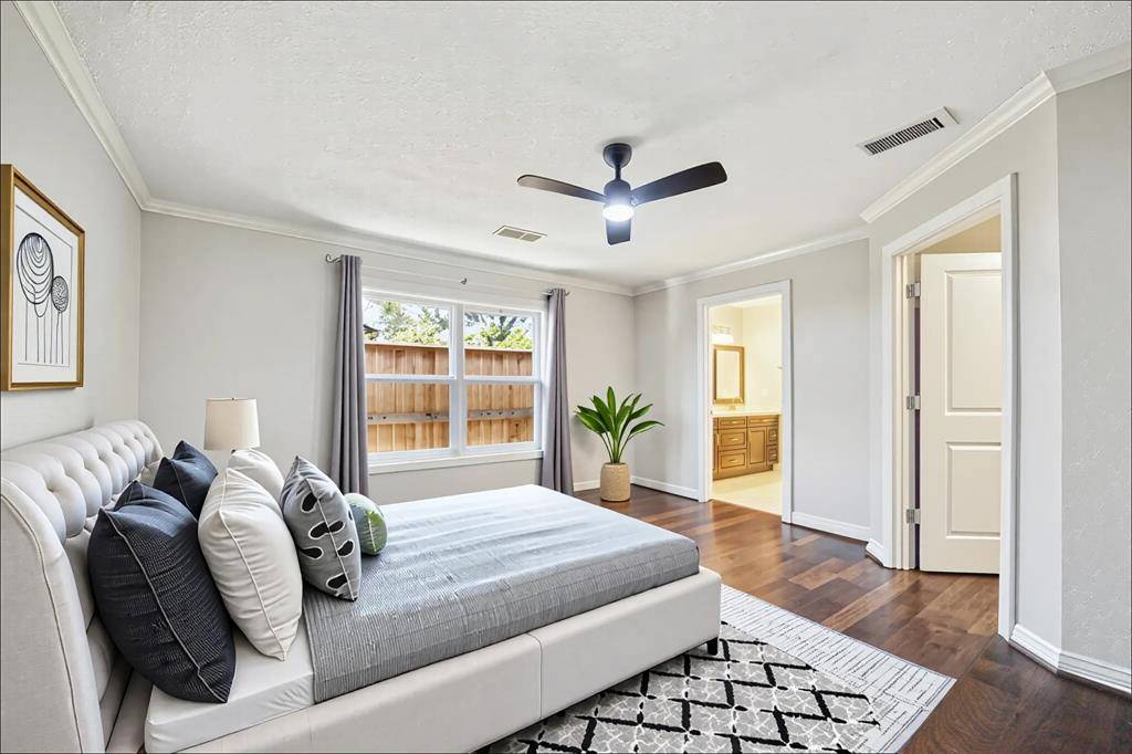 Virtually staged primary suite.