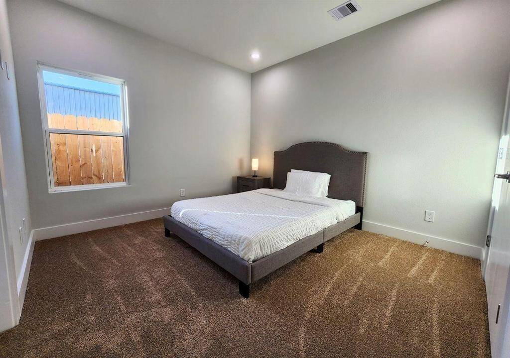 Lots of room downstairs and natural light from picture windows.