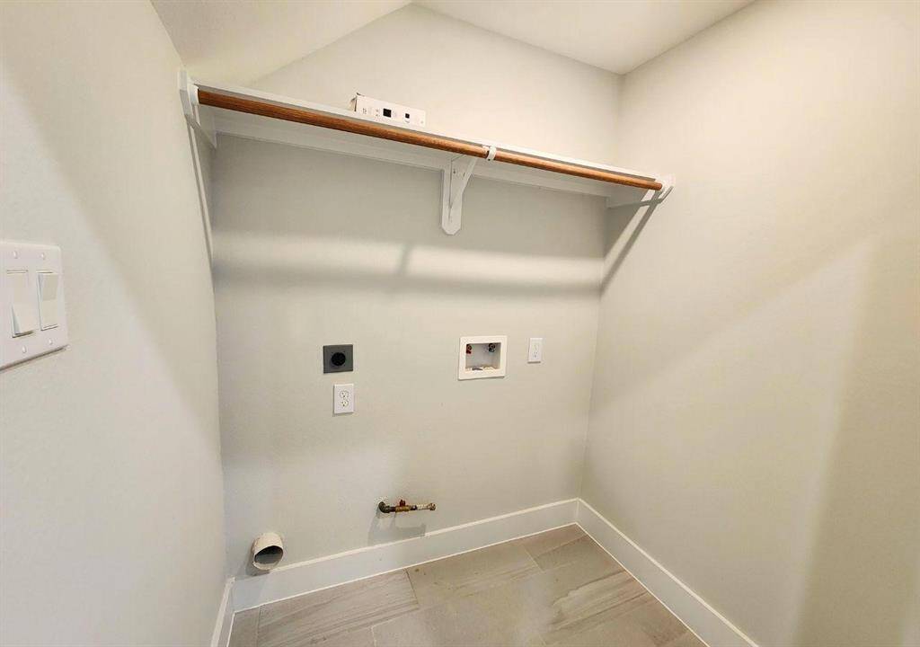Washer and gas dryer hookups.