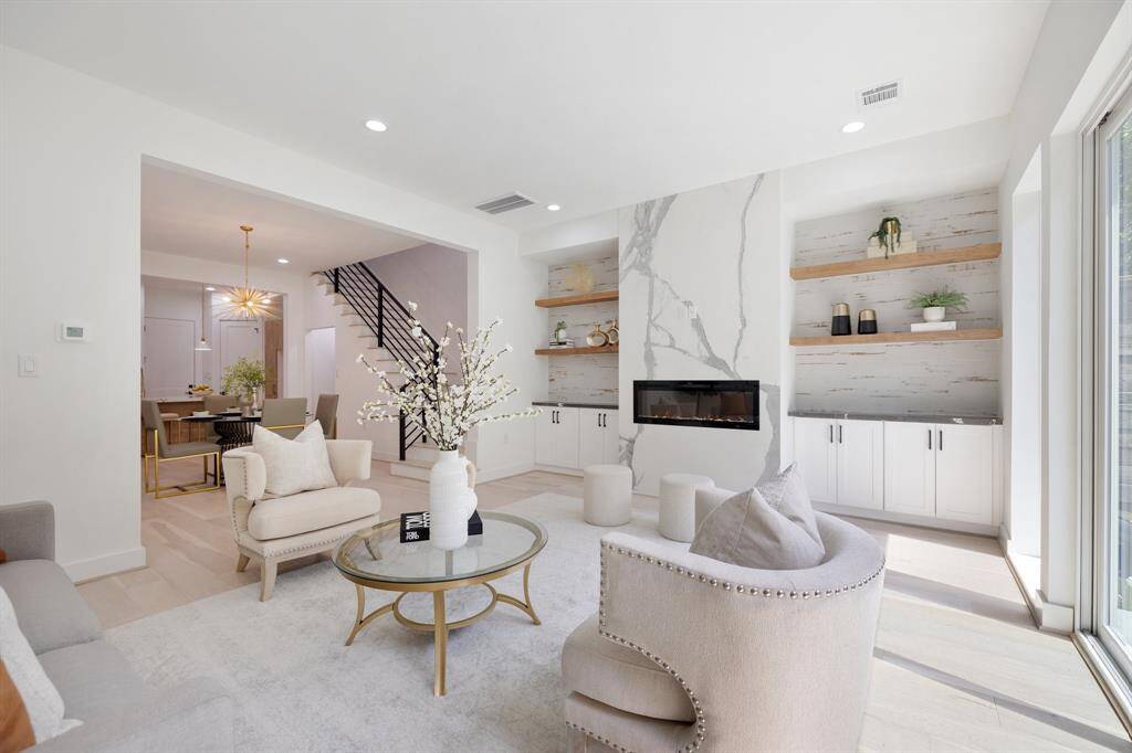 Enjoy open first floor living steps from Houston's largest treasure, Memorial Park.