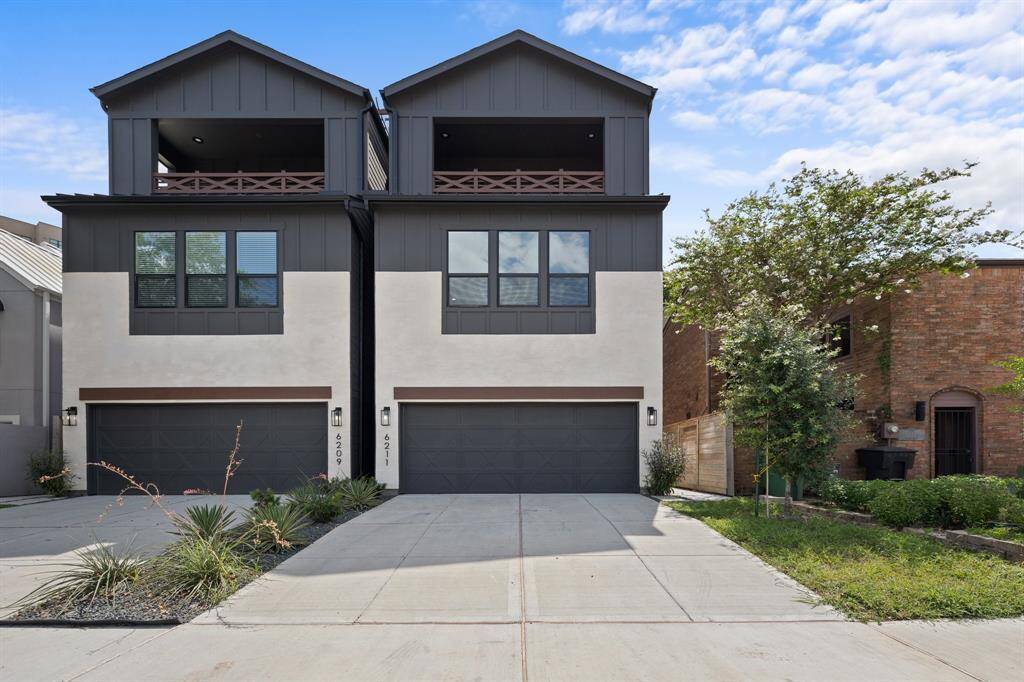 The exterior elevation is stunning with slurried brick and dark accents.