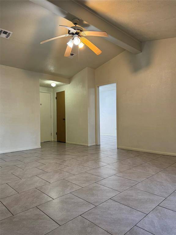 A ceiling fan ensures year-round comfort, keeping the space cool in the summer and circulating warmth in the winter. Durable tile floors add both style and practicality—easy to clean, resistant to wear, and perfect for busy households or pets.