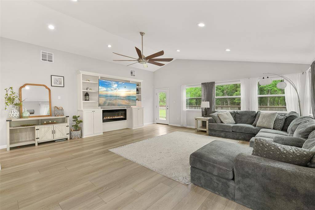 Upon entering, you'll be greeted by an open concept floor plan that seamlessly connects the living, dining, and kitchen areas.