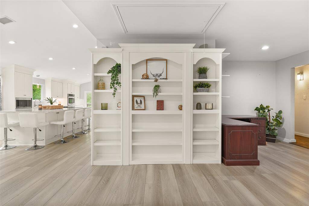 This built-in shelf provides the perfect showcase for your favorite books, decorative items, and cherished memories.