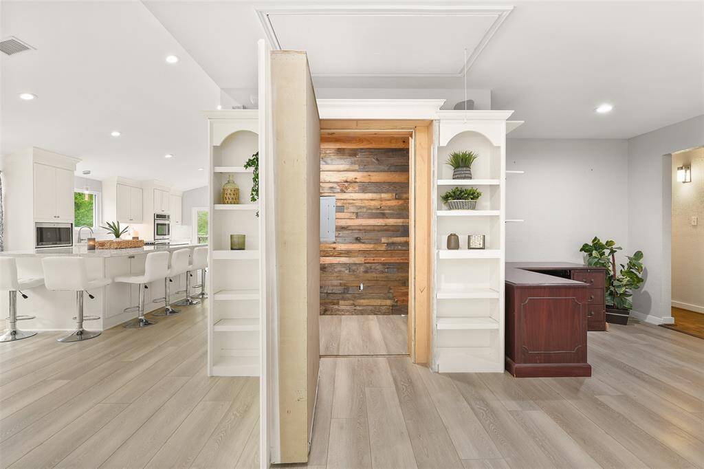 Step into the hidden room behind the bookshelf, a secure and fortified space with endless options. Whether seeking refuge from natural disasters, storing your safe or keepsakes, this hidden safe room offers peace of mind and a sense of security.