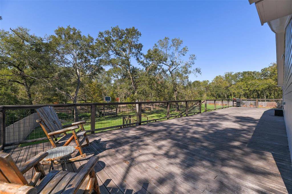 Step outside onto the wrap-around porch, where you can enjoy the scenic views of the surrounding landscape.