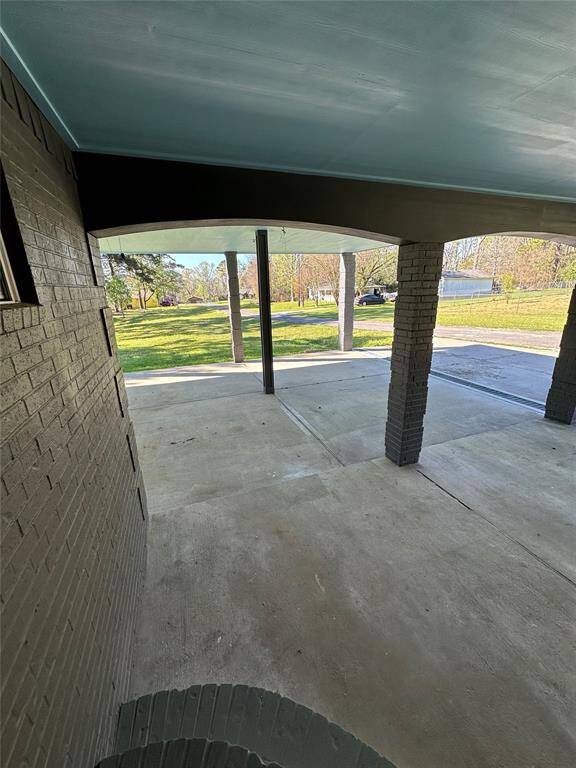3 car carport- perfect for car and/or boat parking