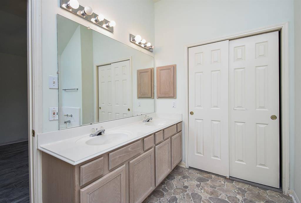 Primary bathroom- double sinks and large walk in closet