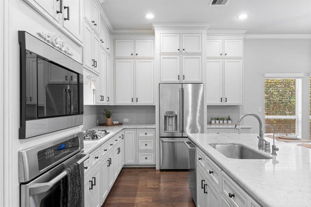 Stainless steel appliances, including a refrigerator that stays.