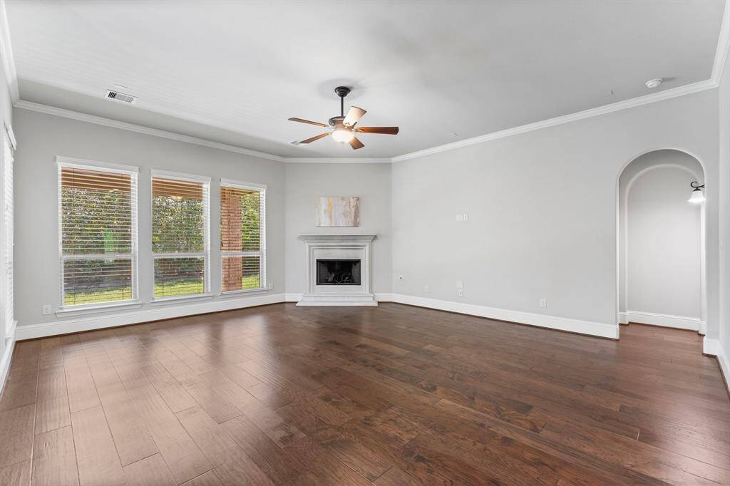 Cozy living area with a stylish gas fireplace as the centerpiece.