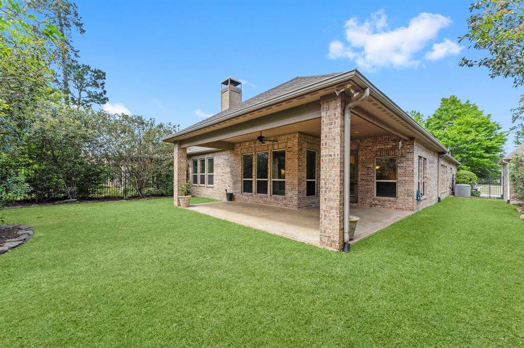 Charming covered patio perfect for outdoor relaxation and entertaining.