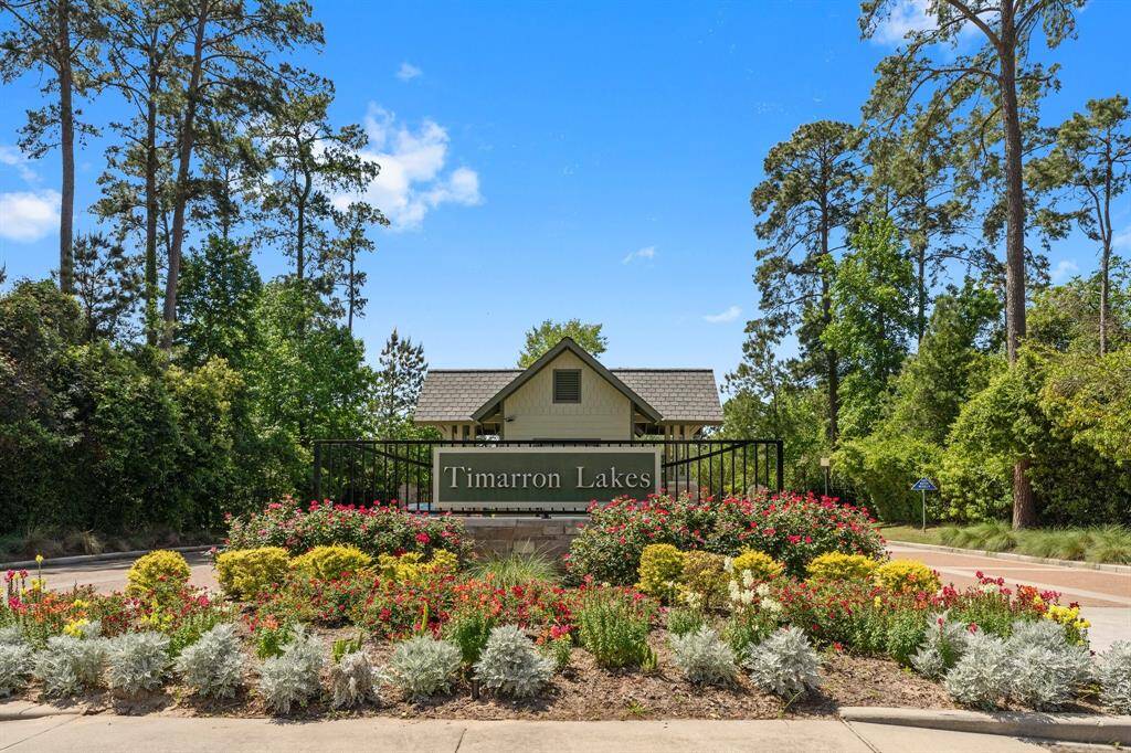 Discover the charm of Timarron Lakes—a beautiful community surrounded by lush greenery and vibrant flowers. Perfect for your dream home.