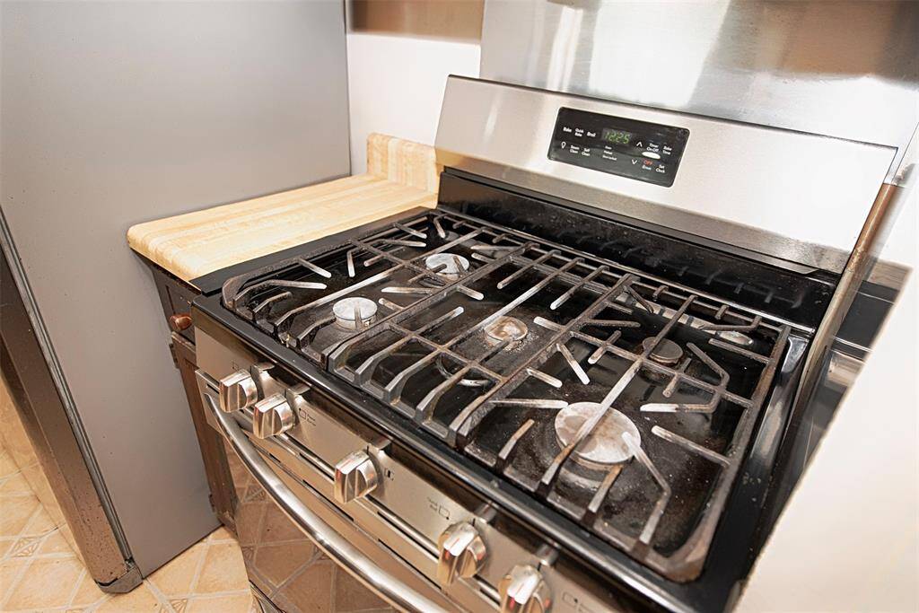 Kitchen also provides a 5 burner gas range.