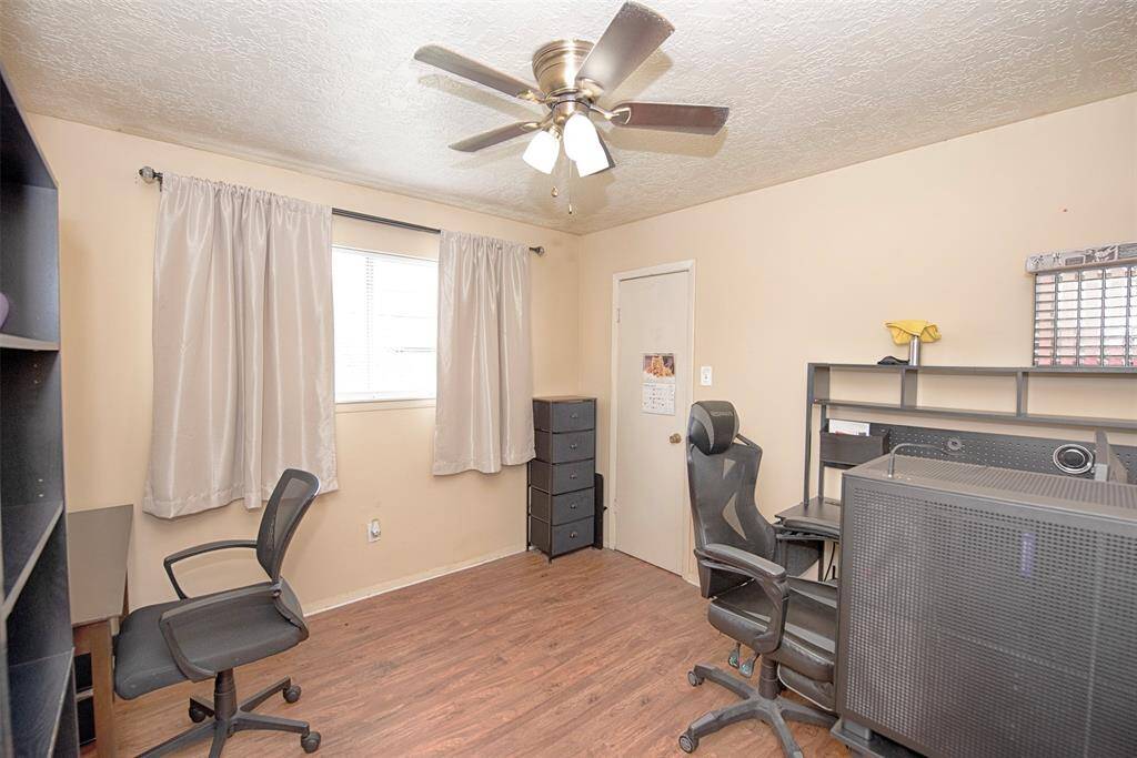 The other secondary bedroom is the perfect spot for a home office if not needed for a bedroom.