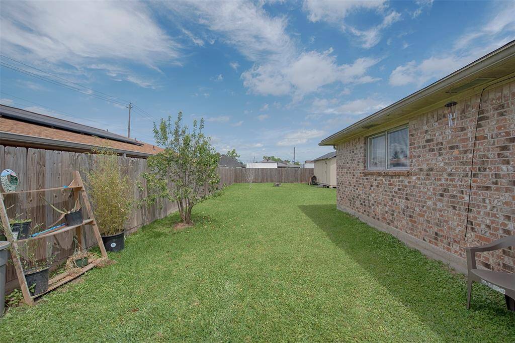 Going out into the back door is a great side area for setting up the grill and having a BBQ party.