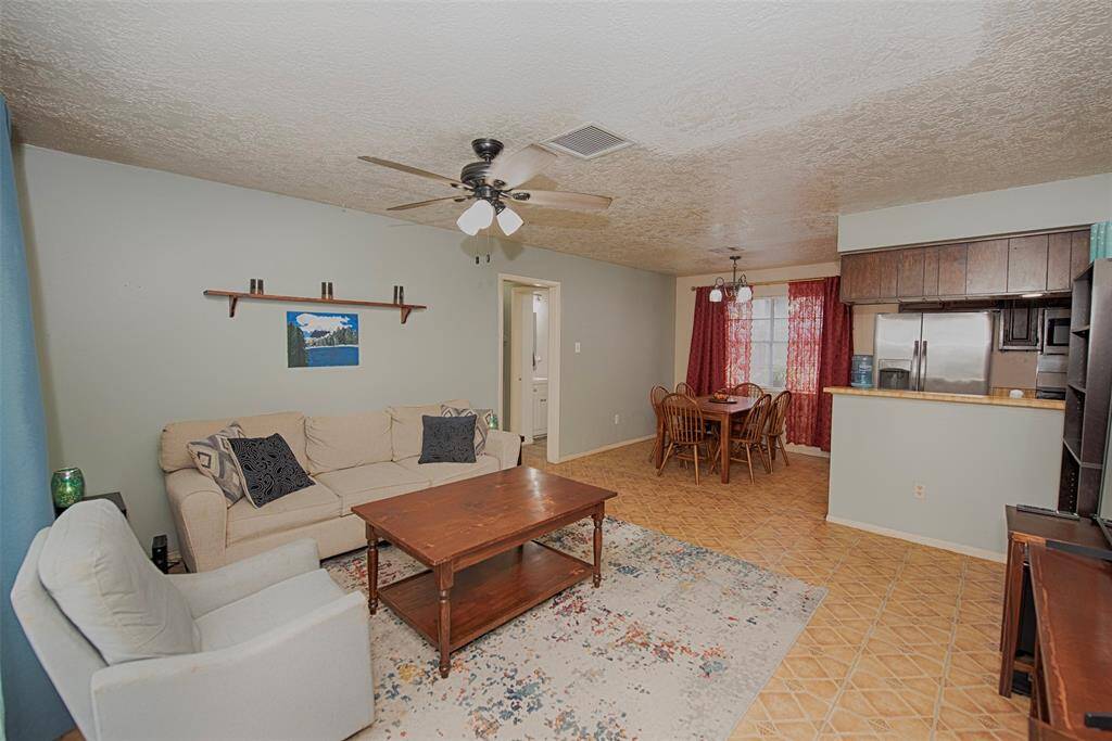 Entry to the family room showing the great space and easy access to the kitchen and dining areas.