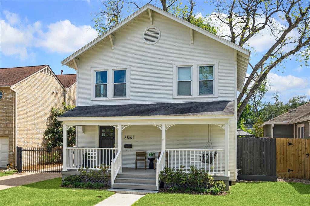 A home that invites you in before you even step inside. The kind of place where neighbors wave from the sidewalk and evenings begin on the porch.