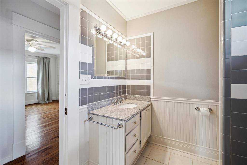 Another view of the main upstairs bath and built-in lighting. Well-positioned between bedrooms for shared access.