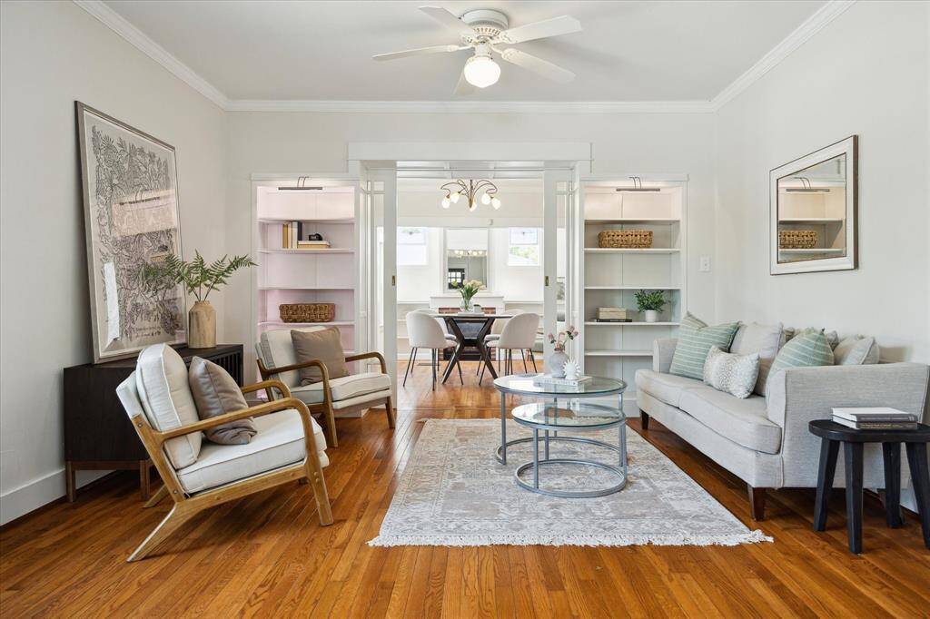 Spacious living area with multiple room connections. The layout supports both quiet moments and lively hosting.