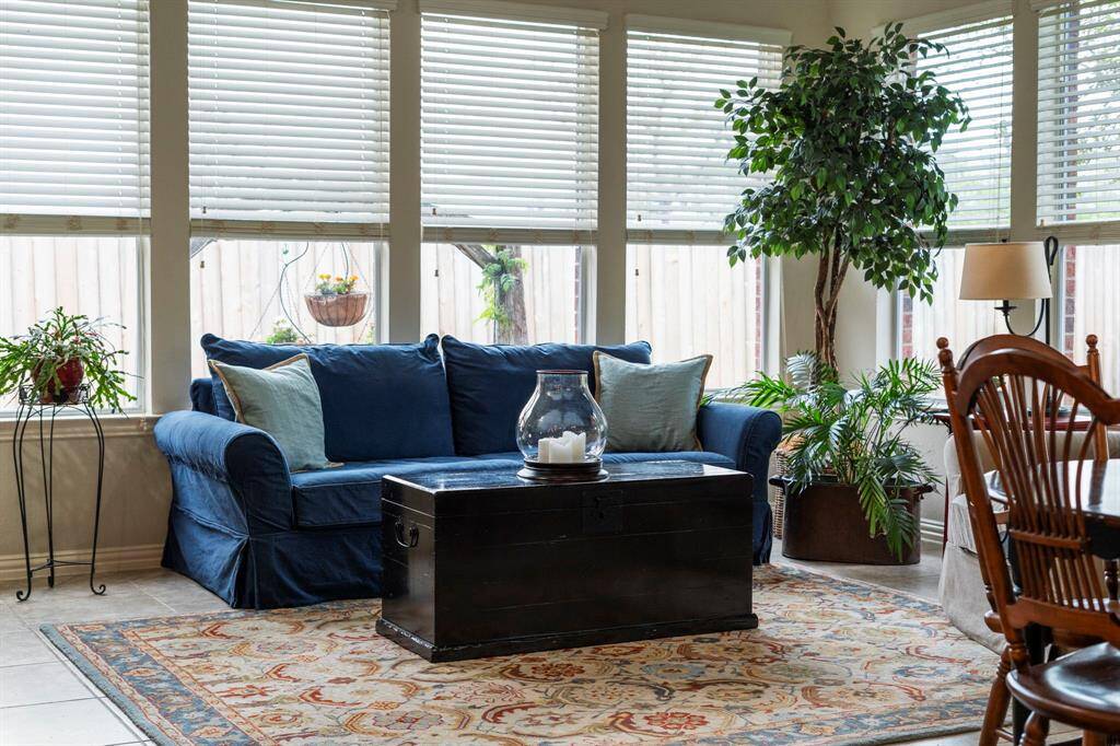 Whether you're enjoying a good book, an afternoon nap, or a relaxing visit with a neighbor, the sunroom is so comfortable you’ll never want to leave.