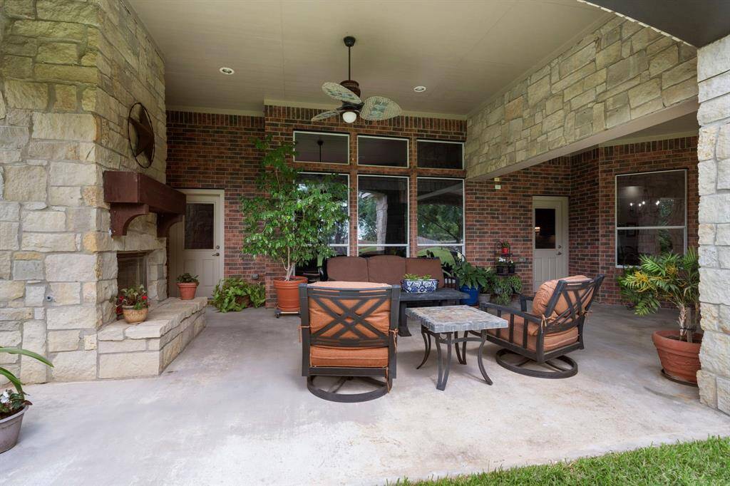 Recessed lighting and lighted ceiling fans allow you to use this outdoor living space at all times of day and in all weather.