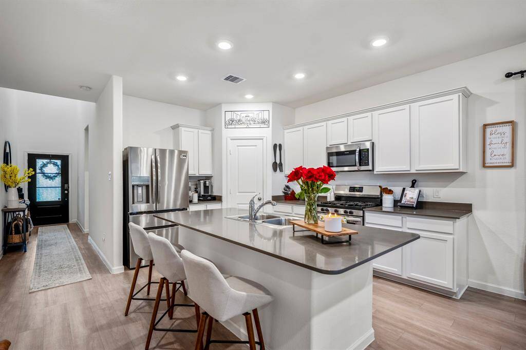 A look at the flow of the home from the front door in this open-concept floor plan.