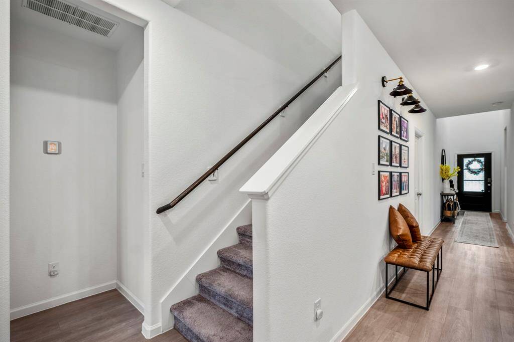 Let's take you into this hallway and show you the primary bedroom.