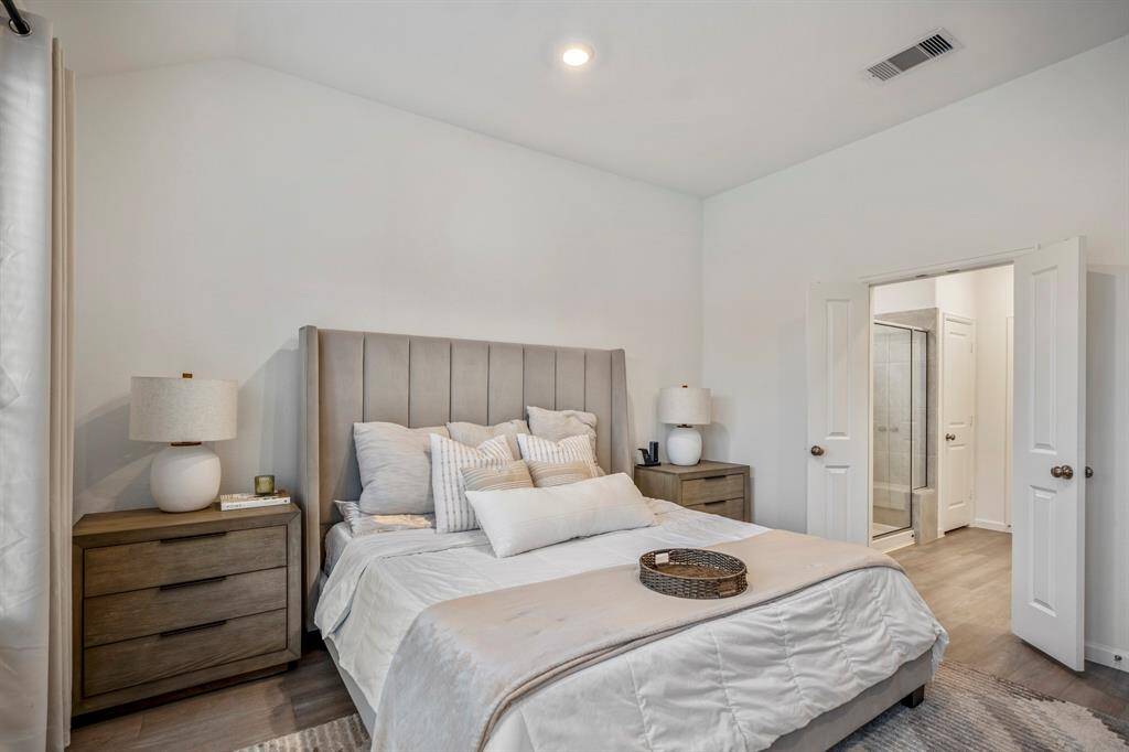 A look at this bedroom in relation to the primary bathroom.