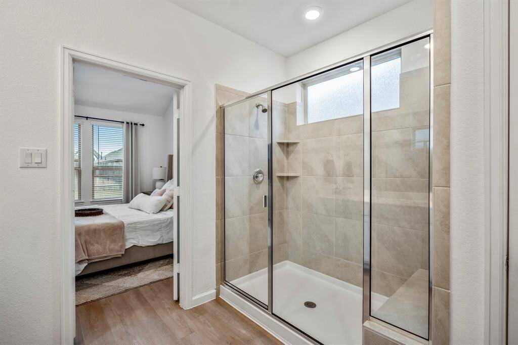 A closer view of this large walk-in shower.