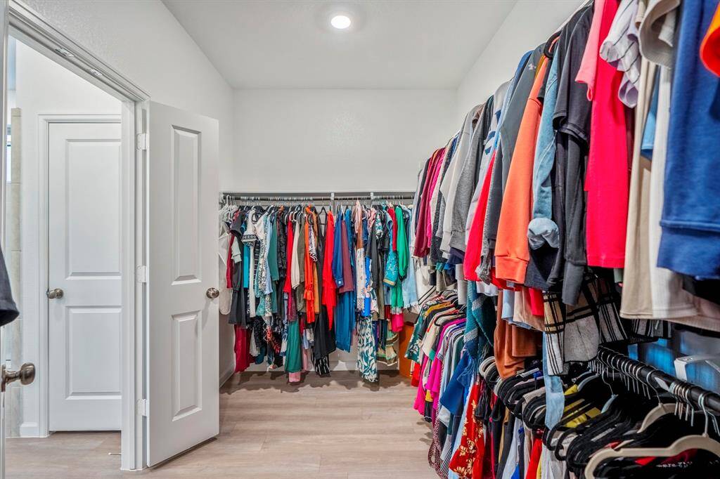 Incredible amount of space in this primary closet.