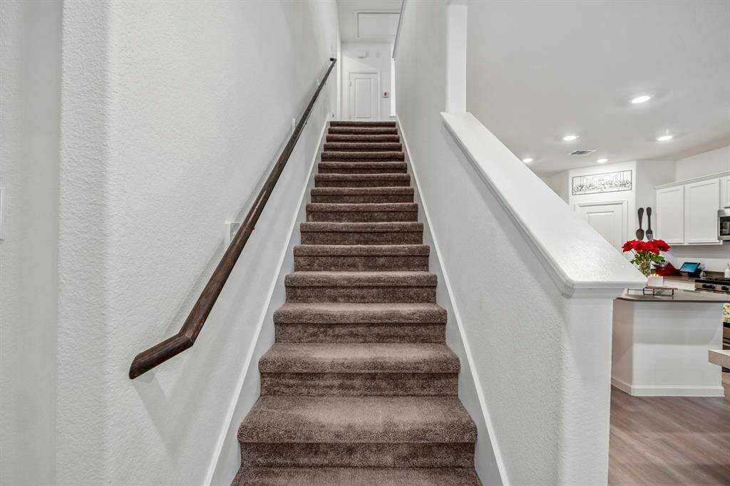 Let's go upstairs to two more bedrooms and a game room.