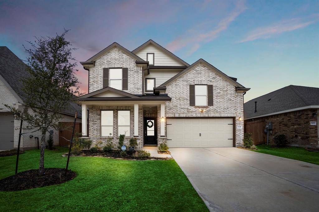 A look at this lovely 4 bedroom, 3 bathroom home at twilight.