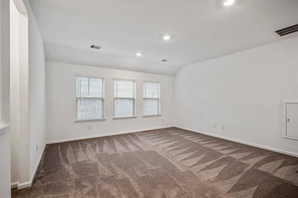 This space can be a home gym, home office, media room, or game room.