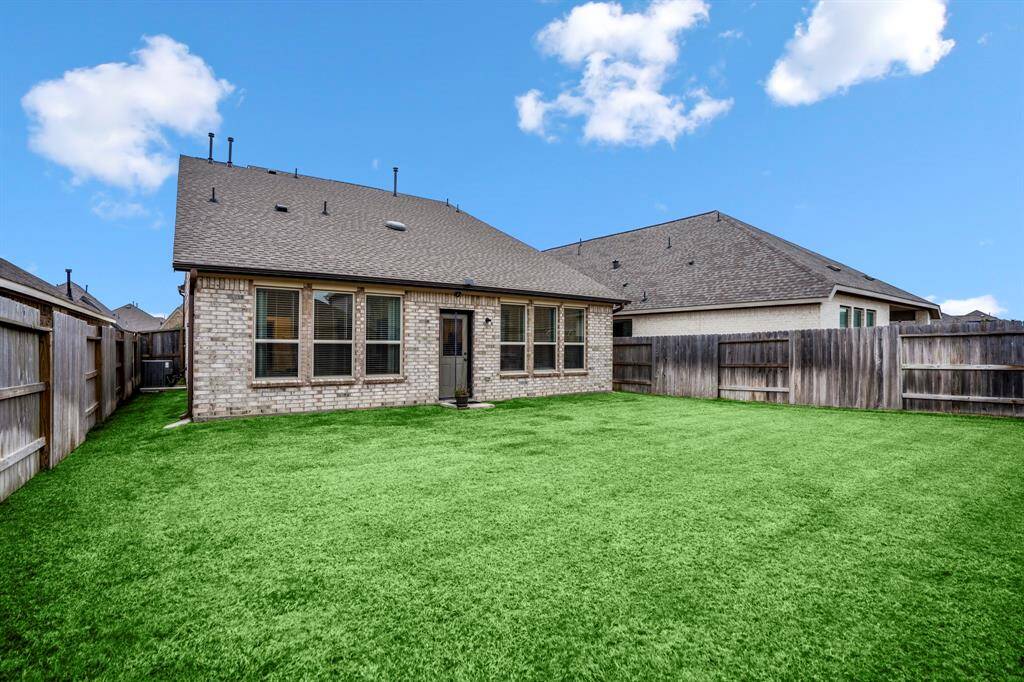 A look at the side yard to this home.