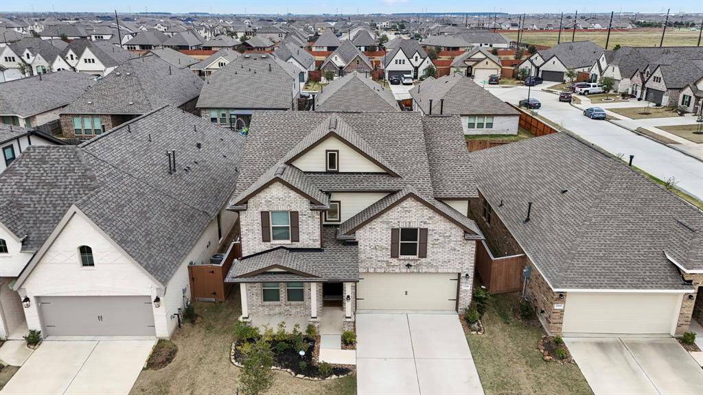 A bird's eye view of this home in relation to neighbors.