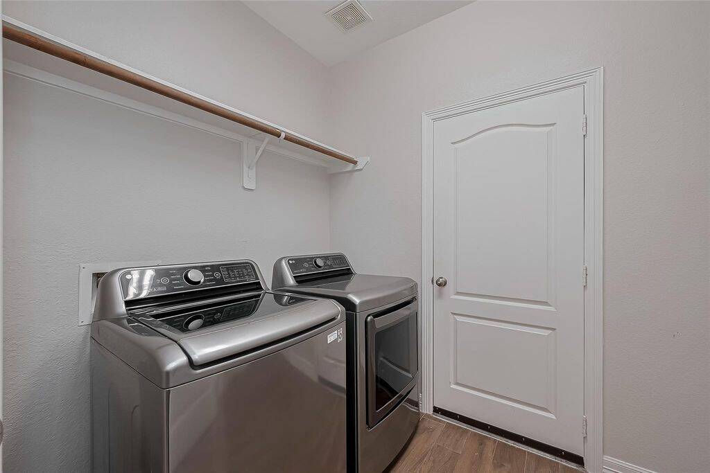 Laundry room leading to garage