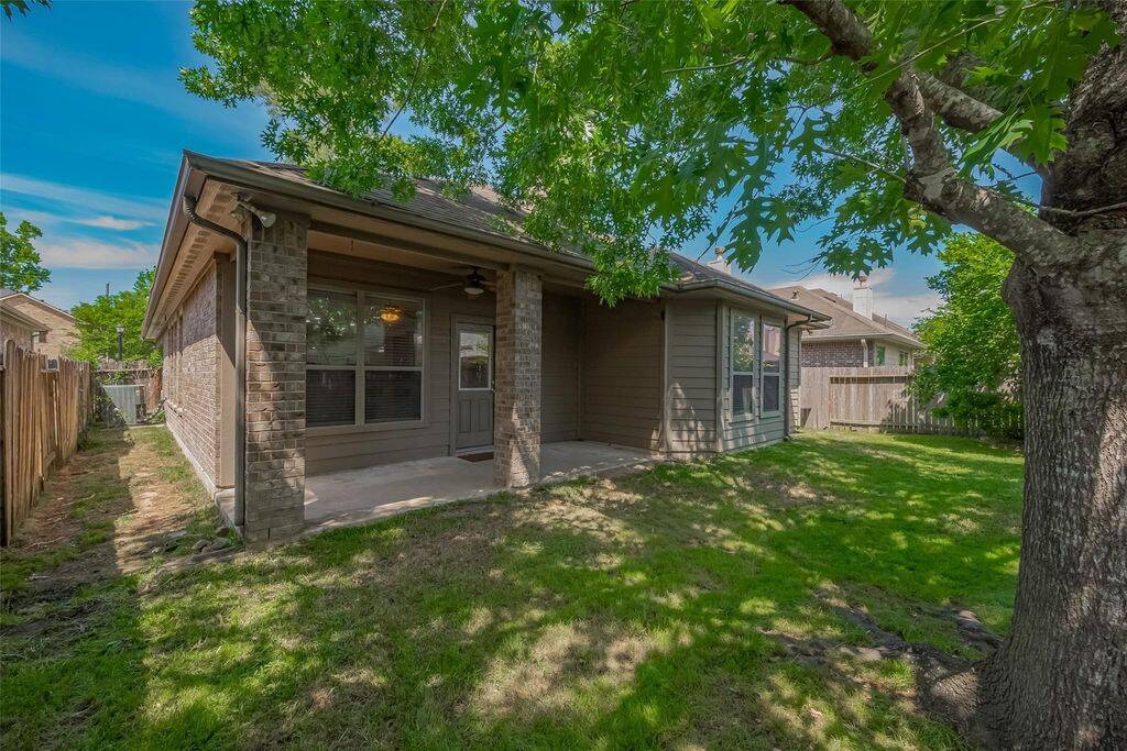 Backyard with covered back patio